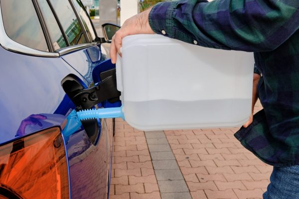 Emergency fuel delivery van helping stranded driver in Reading